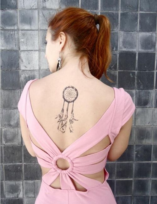 Dreamcatcher tattoo for woman on Back side