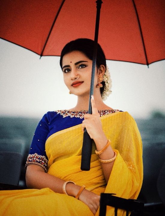 anupama parameswaran Yellow saree with blue blouse