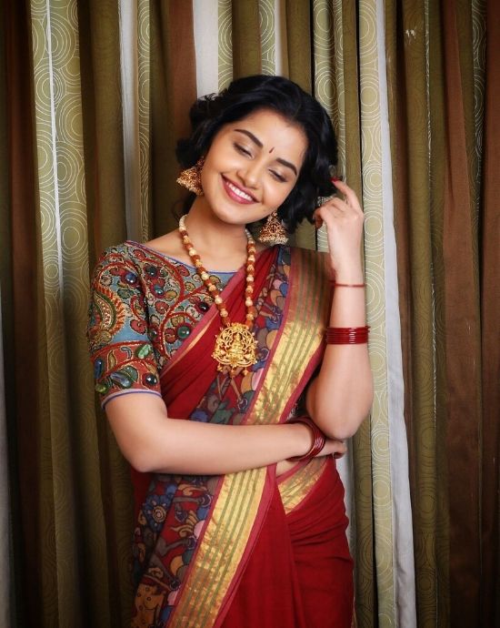anupama parameswaran in red pattu saree