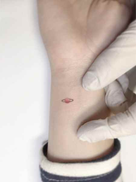 Small Planet tattoo