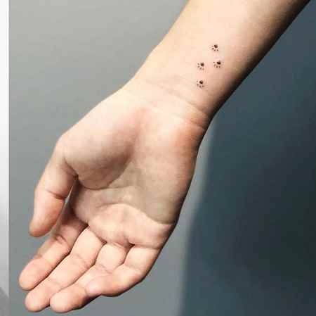 small stoner tattoos on Wrist